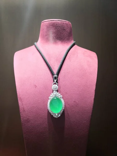 beautiful jewelry with diamond necklace on black background