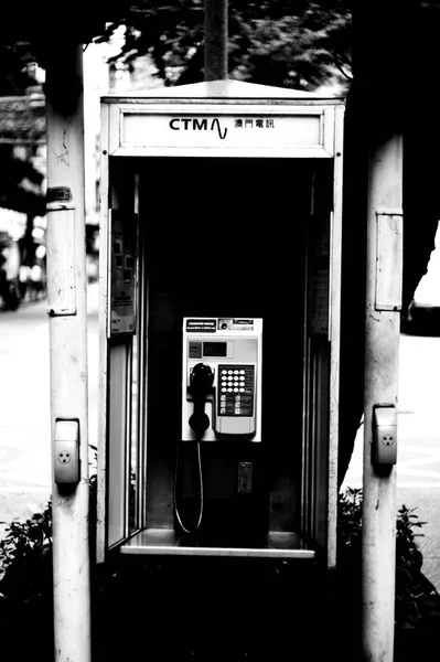 black and white photo of a telephone