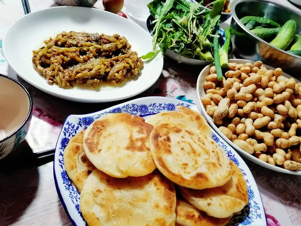 pancakes with meat and vegetables on a plate