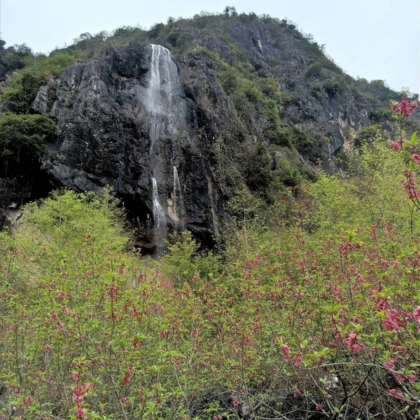 beautiful landscape with a waterfall