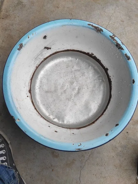 old rusty metal plate with a white background