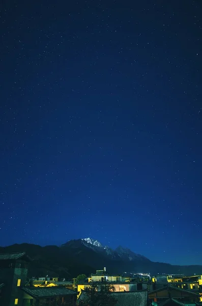 night sky with stars and moon