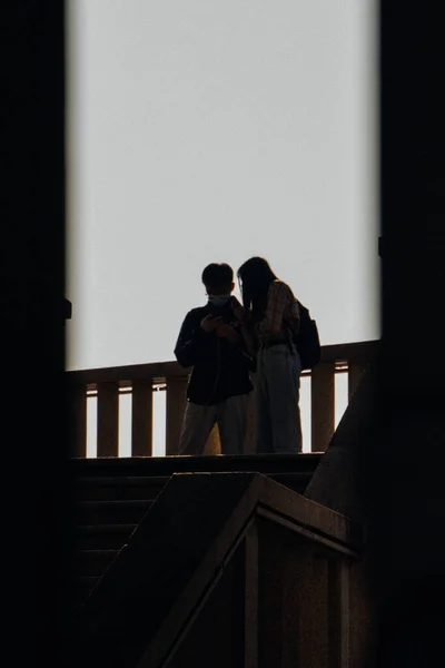silhouette of a couple in a church