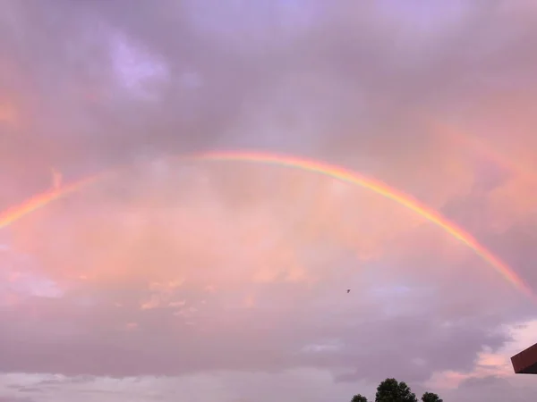 rainbow sky with clouds