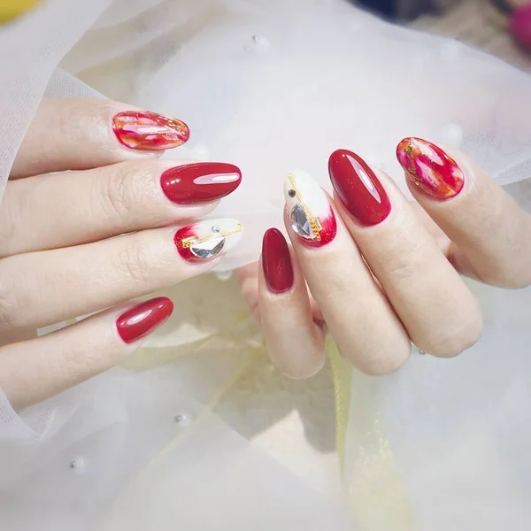 beautiful manicure with a red nail polish