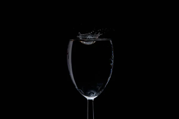 a splash of water on a black background