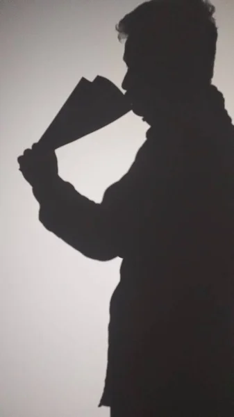 silhouette of a man with a white background