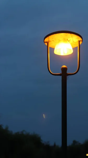 street lamp on the background of the sunset