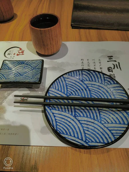 top view of a modern business workplace with a laptop, coffee cup and a pencil