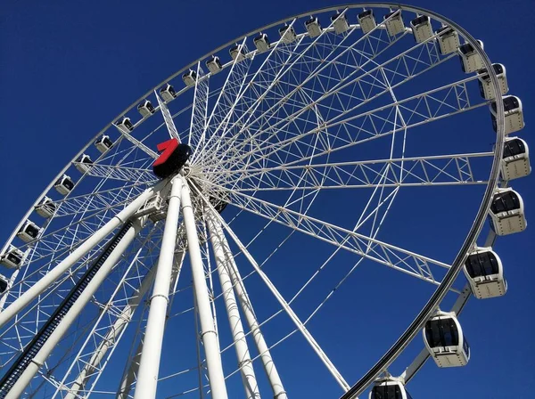 stock image ferris wheel in the blue sky