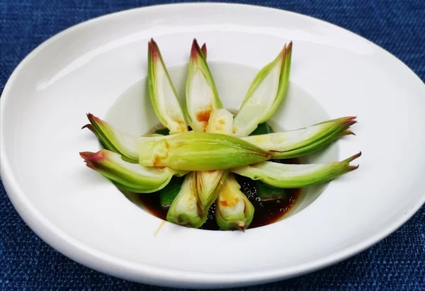 fresh green banana leaves on a plate