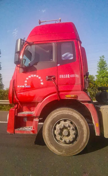 red fire truck on the road