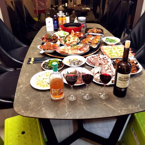 restaurant table with food and drinks