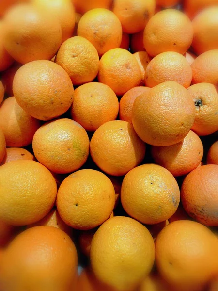 fresh ripe oranges on a white background
