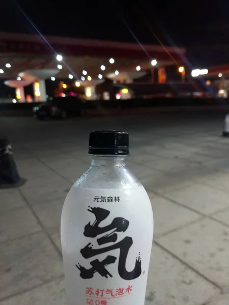 street lamp with a bottle of water