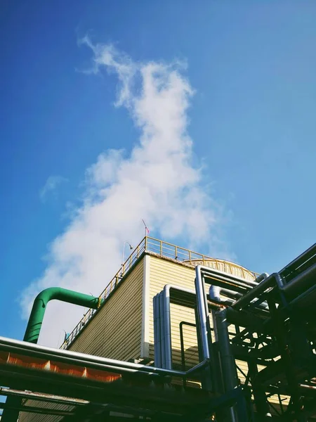 industrial factory, plant, sky and blue clouds