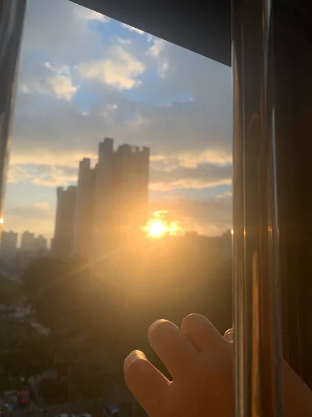 sunset over the window