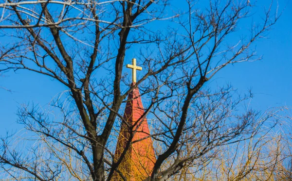 cross on the background of the blue sky