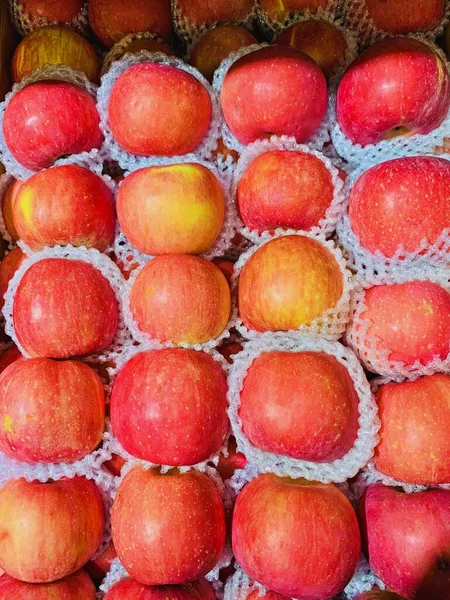 fresh red apples on a white background