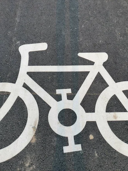 bicycle sign on the asphalt road