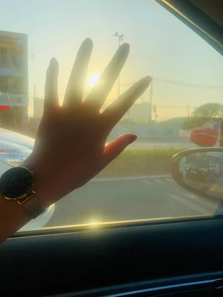 hand with a car in the airport