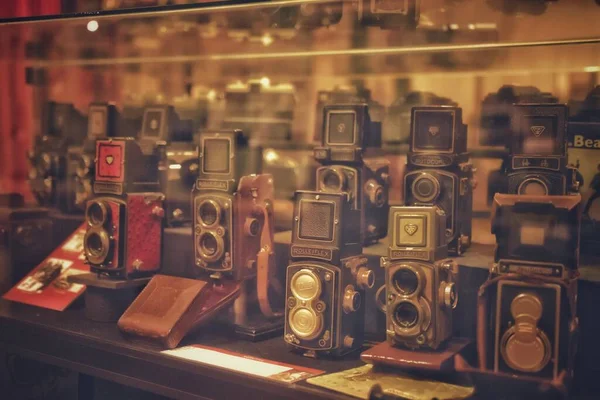 old vintage camera on the background of the wooden table