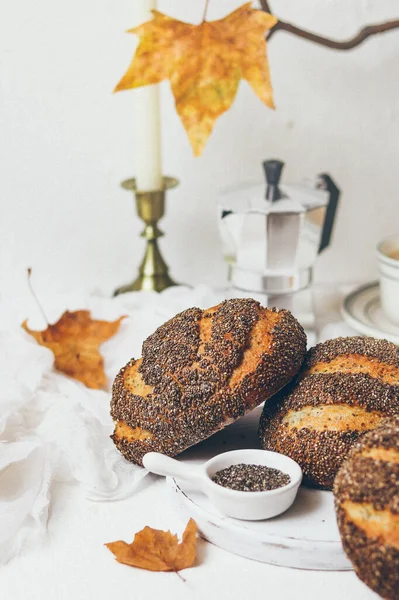 autumn bread with a cup of coffee and a pumpkin