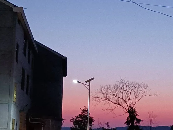 silhouette of a house in the city