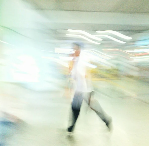 blurred image of people in motion blur