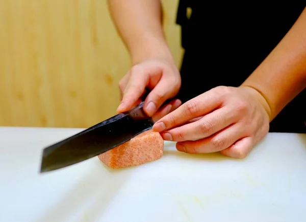 chef cutting knife on a wooden board