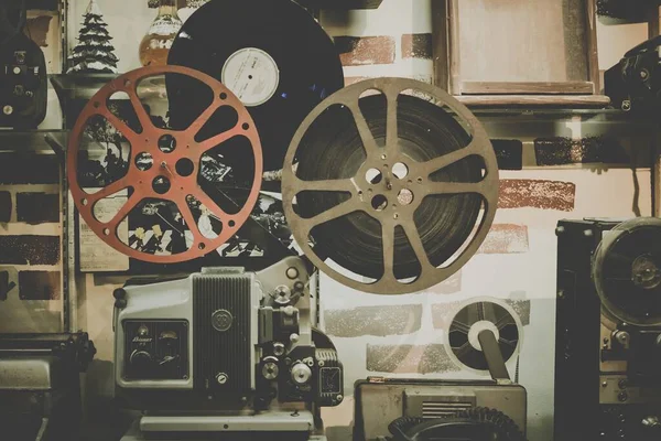 old film reel on the background of the movie camera