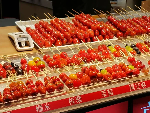 red and white cherry tomatoes in the market