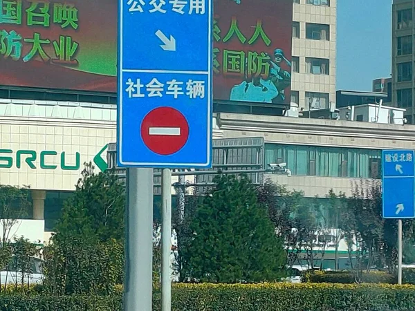 street sign with a lot of people signs