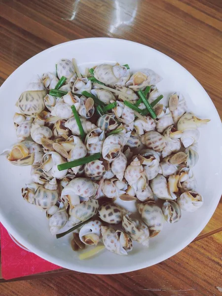 seafood-boiled squid with garlic and parsley