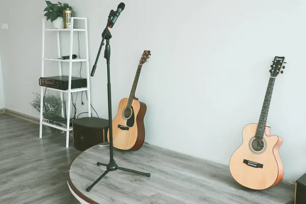 acoustic guitar on brick wall background