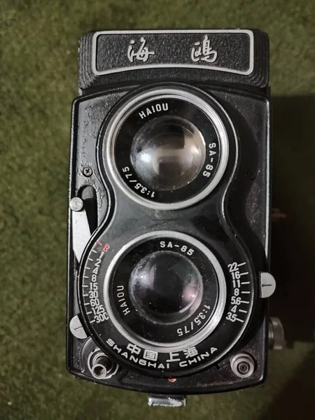 old camera on a background of a black and white photo