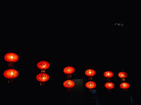 chinese lanterns in the night sky