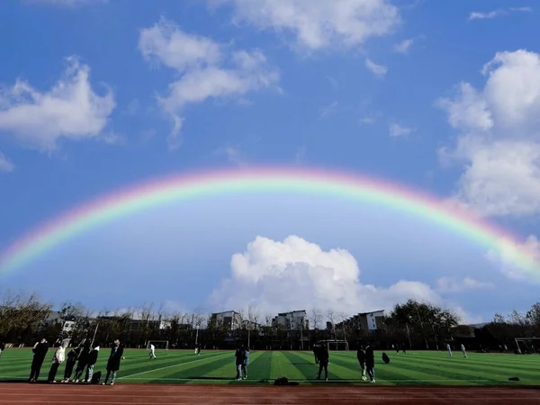 rainbow sky with clouds and blue skies