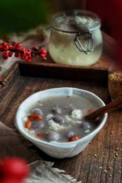 homemade soup with red and white sauce