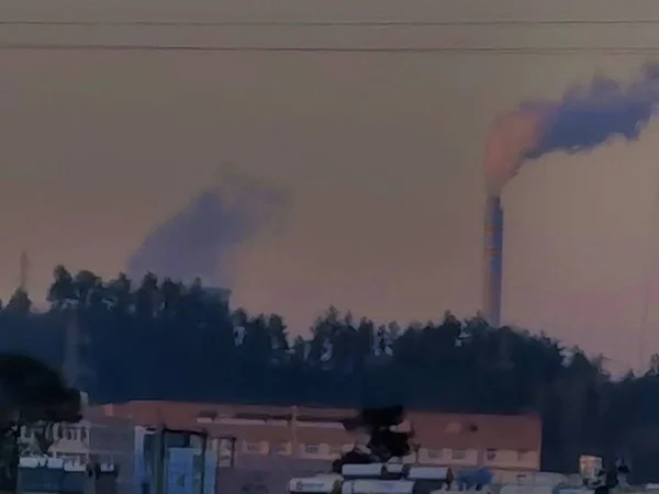 smoke from the chimney, industrial background