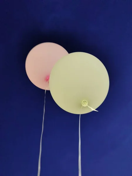 white balloons on a blue background