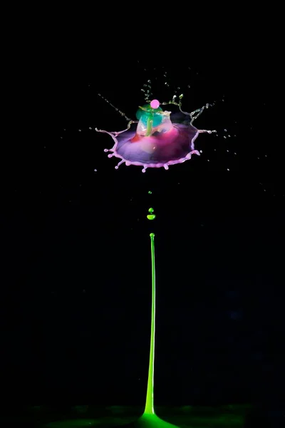 colorful water splash on black background