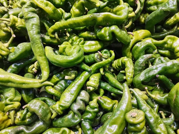 green and white pepper on a market stall