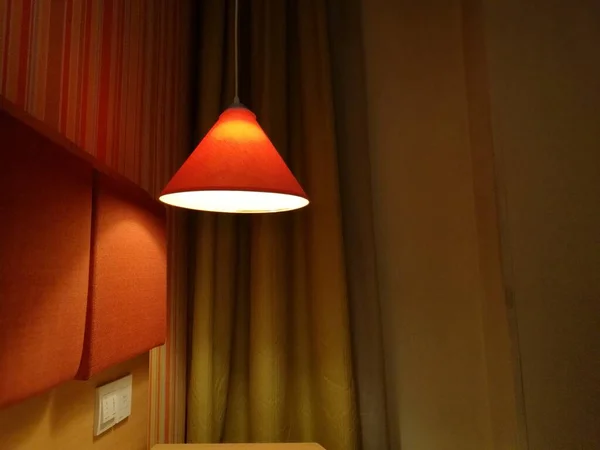 interior of a room with a lamp