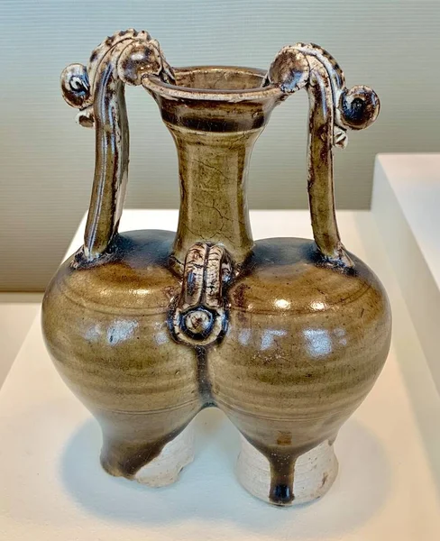 old wooden table with a vase