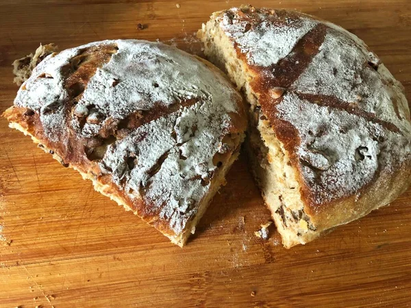 homemade bread with poppy seeds and powdered sugar