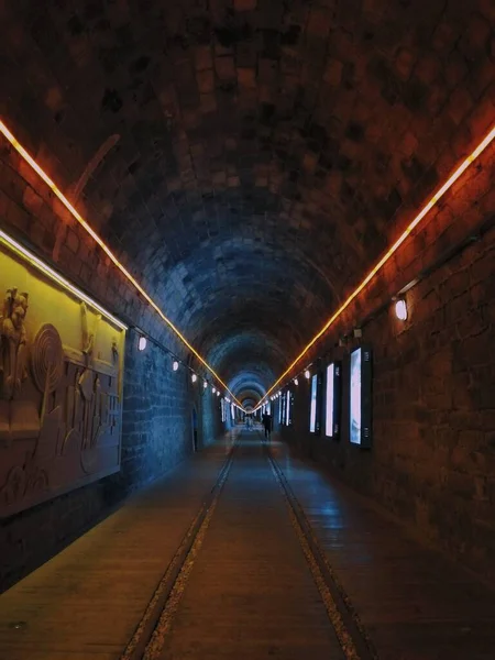 underground tunnel with lights and light