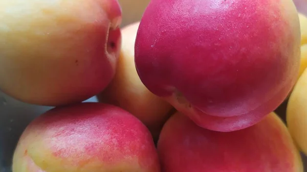 fresh red apples on a white background