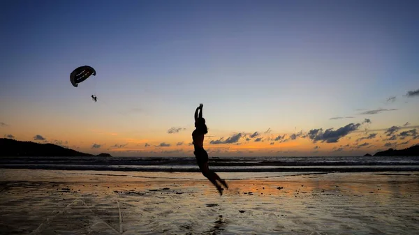 silhouette of a man on the beach