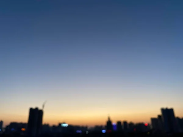 blurred view of city skyline